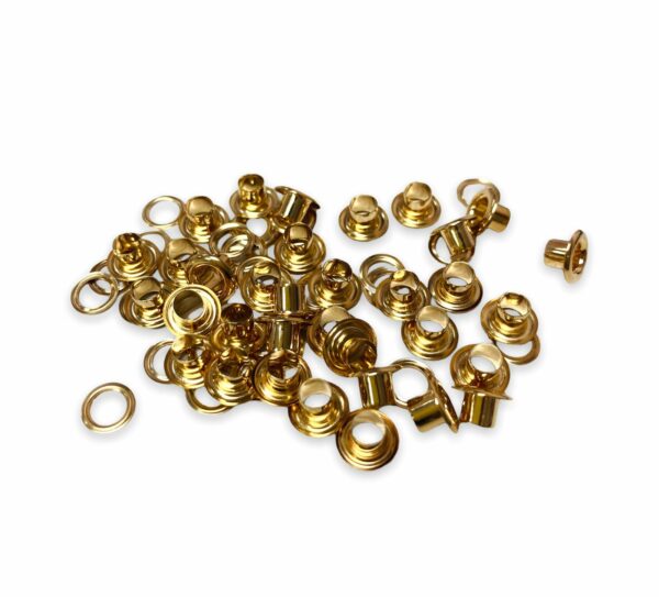 Eyelets 3/16” (.5cm ) Paq. 50 pzas  Oro Rosado / Sirve para sujetar elástico en libretas