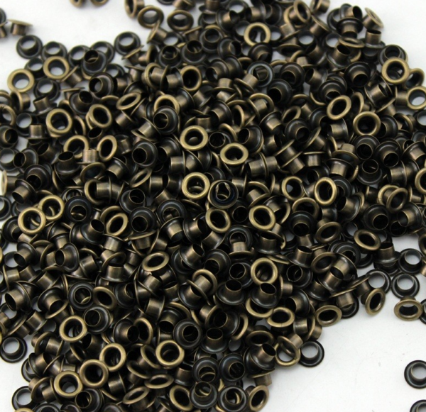 Eyelets 3/16” (.5cm ) Paq. 50 pzas  Bronce -  Para cartulinas o Tags