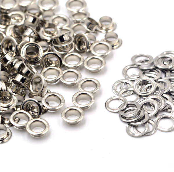 Eyelets 3/16” (.5cm ) Paq. 50 pzas Plata -  Para cartulinas o Tags