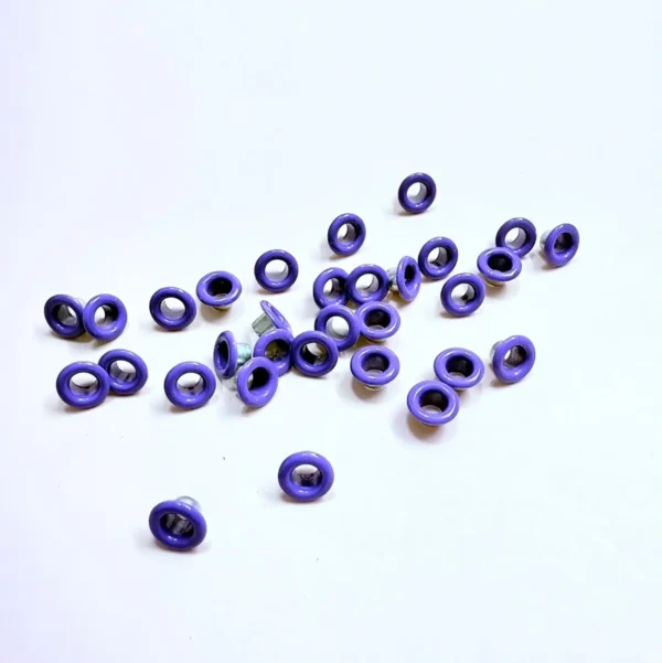 Eyelets 3/16” (.5cm ) Paq. 100 pzas  Morado/ Sirve para sujetar elástico en libreta