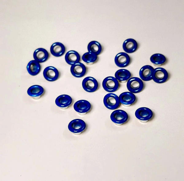 Eyelets 3/16” (.5cm ) Paq. 100 pzas  Azul Marino/ Sirve para sujetar elástico en libreta